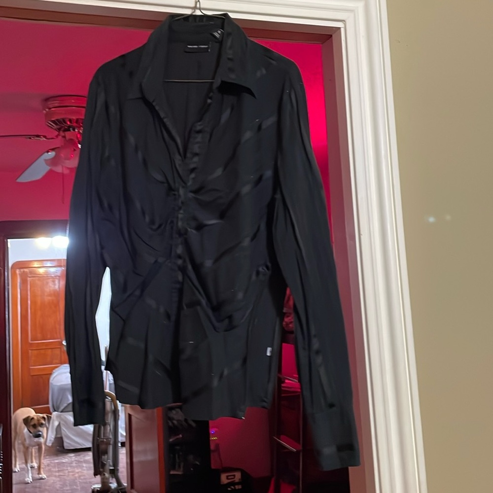 Black long sleeve top.